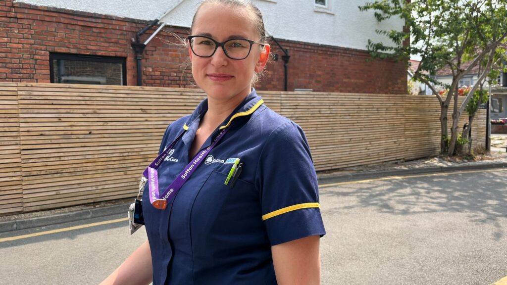 District nurse Anna outside Cheam Baptist church during neighbourhood health clinic