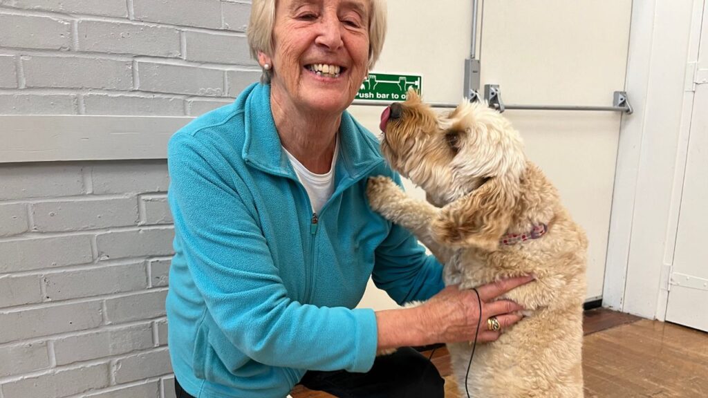 Gail singing sensation group member with her dog