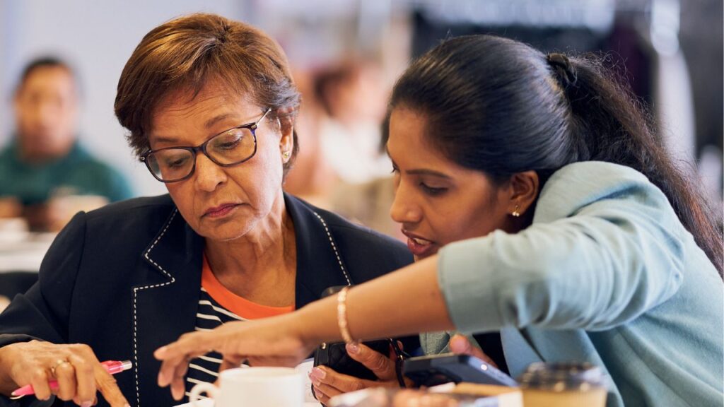 Two care home managers take part in an exercise during the south west London kidney care event
