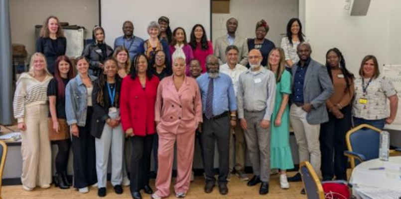 Group of people attending the anti-racism conference.