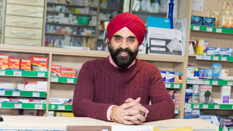 Pharmacist at counter
