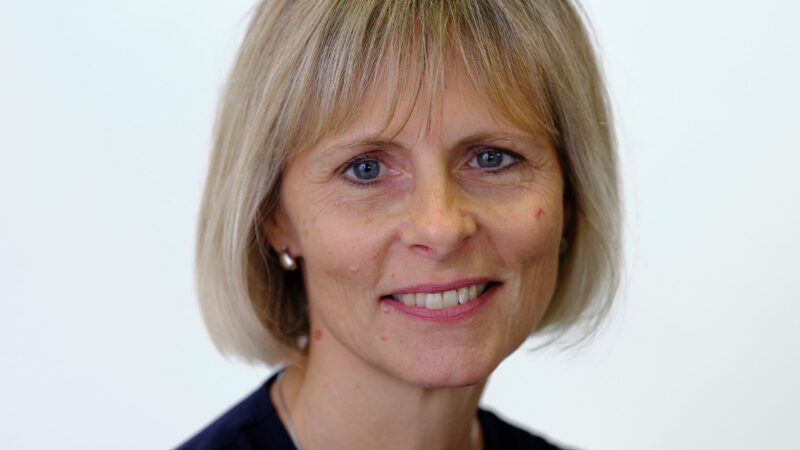 Image of woman smiling at the camera