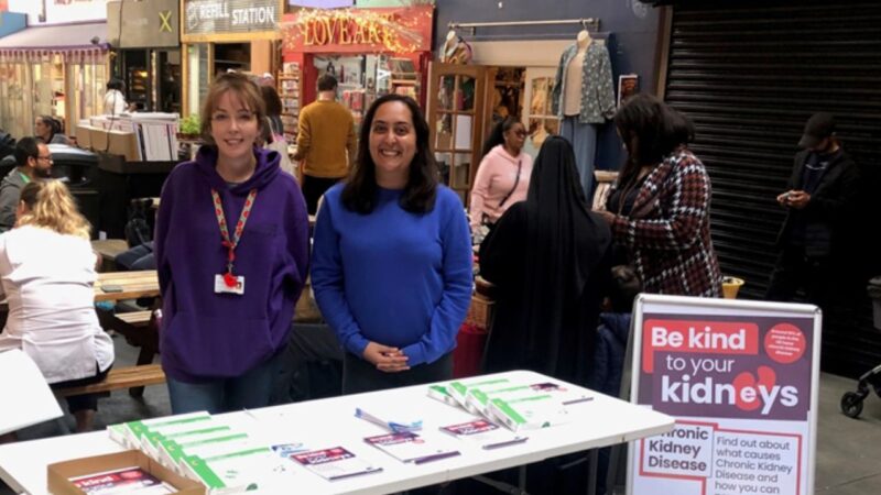 Engagement about kidney disease at a market stall, Tooting Market Wandsworth as part of be kind to your kidneys campaign